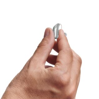 Hand met Ampli-energy 5D